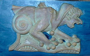 Un des médaillons du plafond de la salle de la mairie. Un des médaillons du plafond de la salle de la mairie.